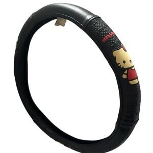 Hello Kitty Stiring Wheel Cover 14” black with red dress & red bow red letters.